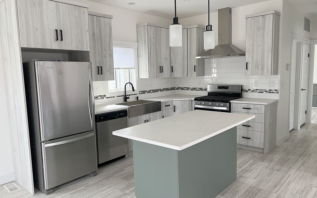 Kitchen with Feather White Textured Cabinets