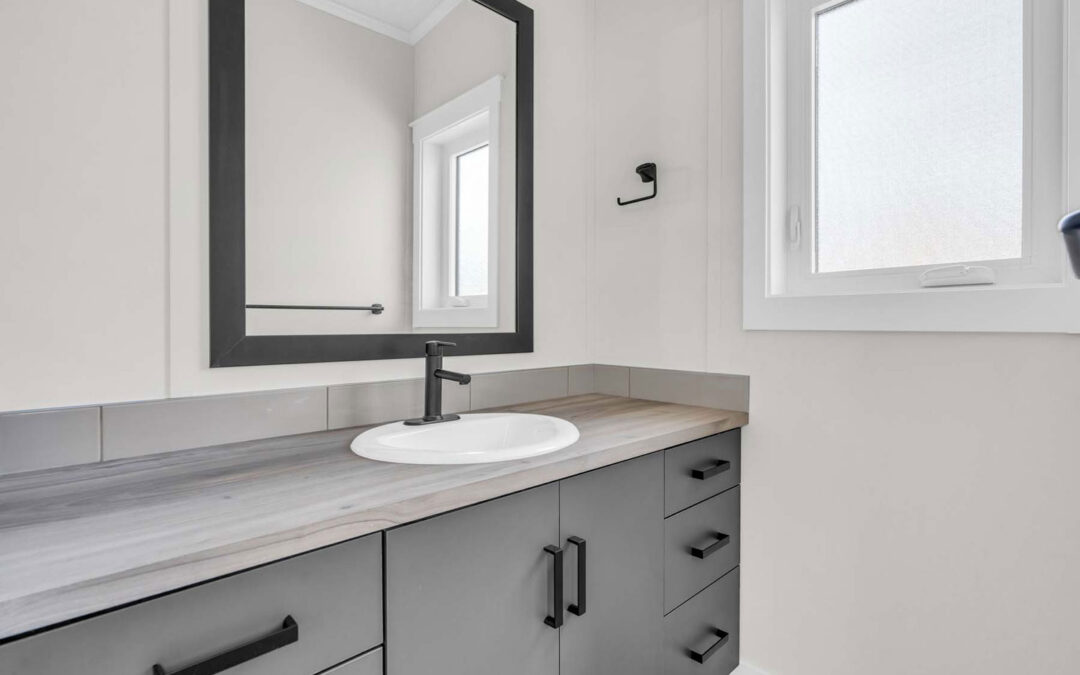 Bathroom with Charcoal Cabinets and Black Hardware